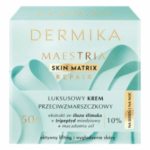 Mint green box of Dermika Maestria Skin Matrix Repair 50+ Anti-Wrinkle Cream with snail extract and macadamia oil.