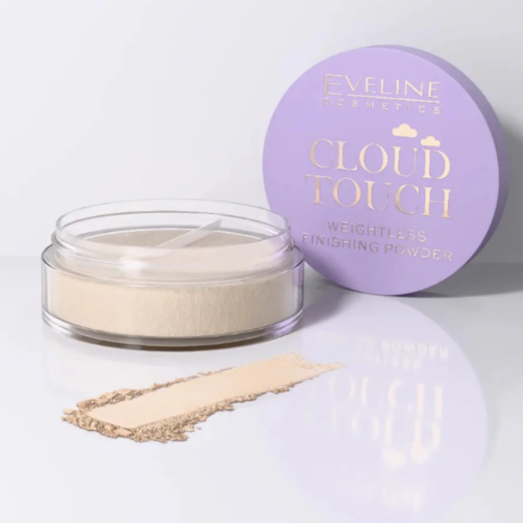 Eveline Cosmetics Cloud Touch weightless finishing powder in a clear jar with pastel purple lid and loose beige powder texture.