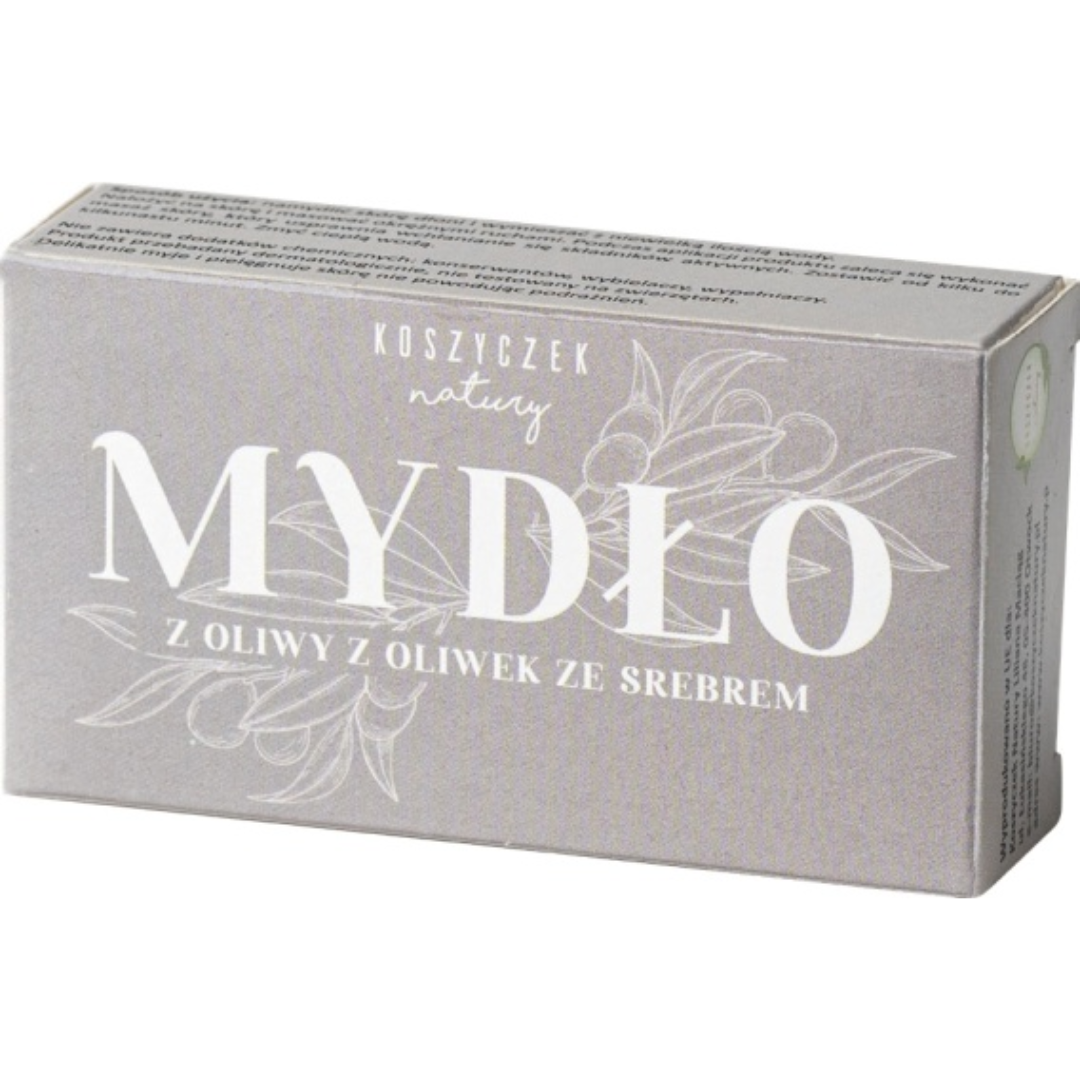 Koszyczek Natury olive oil soap with silver bar soap packaging featuring elegant silver-grey design and olive branch illustration.